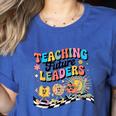 Retro Teaching Future Leaders Groovy Teacher Back To School Women's Heather T-Shirt Heather True Royal