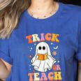 Retro Vintage Groovy Trick Or Teach Teacher Halloween For Men Women Kids Women's Heather T-Shirt Heather True Royal