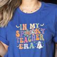 In My Spooky Teacher Era Groovy Hippie Retro Ghost Halloween Men Women Kids Women's Heather T-Shirt Heather True Royal In My Spooky Teacher Era Groovy Hippie Retro Ghost Halloween Men Women Kids Women's Heather T-Shirt Heather True Royal