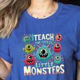 I Teach The Cutest Little Monsters Teacher Halloween Outfit Women's Heather T-Shirt Heather True Royal I Teach The Cutest Little Monsters Teacher Halloween Outfit Women's Heather T-Shirt Heather True Royal