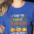 I Teach The Cutest Pumpkins Halloween Teacher Women's Heather T-Shirt Heather True Royal I Teach The Cutest Pumpkins Halloween Teacher Women's Heather T-Shirt Heather True Royal