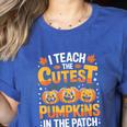 I Teach The Cutest Pumpkins Shirt Teachers Halloween Women's Heather T-Shirt Heather True Royal I Teach The Cutest Pumpkins Shirt Teachers Halloween Women's Heather T-Shirt Heather True Royal