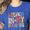 I Teach In My Pajamas Retro Groovy Teacher Humor Women's Heather T-Shirt Heather True Royal