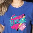 Teacher 90s Retro Colorful Teacher Of The 90s Back To School Women's Heather T-Shirt Heather True Royal Teacher 90s Retro Colorful Teacher Of The 90s Back To School Women's Heather T-Shirt Heather True Royal