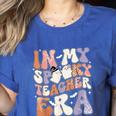Teacher Halloween In My Spooky Teacher Era Retro Groovy Women's Heather T-Shirt Heather True Royal Teacher Halloween In My Spooky Teacher Era Retro Groovy Women's Heather T-Shirt Heather True Royal