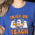 Teacher Halloween Trick Or Teach Retro Groovy Floral Ghost Women's Heather T-Shirt Heather True Royal Teacher Halloween Trick Or Teach Retro Groovy Floral Ghost Women's Heather T-Shirt Heather True Royal
