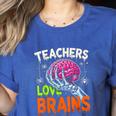 Teachers Love Brains Halloween 2025 Skeleton Costume Women's Heather T-Shirt Heather True Royal Teachers Love Brains Halloween 2025 Skeleton Costume Women's Heather T-Shirt Heather True Royal