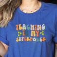Teaching Is My Superpower Vintage Groovy University Teacher Women's Heather T-Shirt Heather True Royal