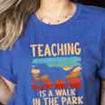 Teaching Is a Walk In Park Dinosaur Teacher Women's Heather T-Shirt Heather True Royal