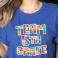 Team 5th Grade Building Blocks Bricks Theme Teacher Team For Men Women Kids Women's Heather T-Shirt Heather True Royal Team 5th Grade Building Blocks Bricks Theme Teacher Team For Men Women Kids Women's Heather T-Shirt Heather True Royal