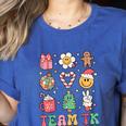 Team TK Teacher Christmas Groovy Smile Face Girl Boy Kid TK Women's Heather T-Shirt Heather True Royal Team TK Teacher Christmas Groovy Smile Face Girl Boy Kid TK Women's Heather T-Shirt Heather True Royal
