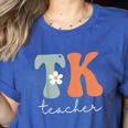 TK Teacher Retro Groovy Vintage Happy First Day Of School Women's Heather T-Shirt Heather True Royal