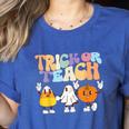 Trick Or Teach Cute Halloween Teacher Women's Heather T-Shirt Heather True Royal