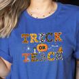 Trick Or Teach Funny School Teacher Halloween Costume Women's Heather T-Shirt Heather True Royal