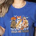 Trick Or Teach Groovy Teacher Halloween Floral Ghost Women's Heather T-Shirt Heather True Royal Trick Or Teach Groovy Teacher Halloween Floral Ghost Women's Heather T-Shirt Heather True Royal