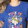 Trick Or Teach Groovy Teacher Halloween Retro Teacher Ghost Women's Heather T-Shirt Heather True Royal Trick Or Teach Groovy Teacher Halloween Retro Teacher Ghost Women's Heather T-Shirt Heather True Royal