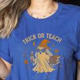 Trick Or Teach Halloween Teacher Women's Heather T-Shirt Heather True Royal