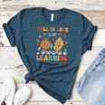 Groovy Fall In Love With Learning Autumn Pumpkin Teacher Women's Heather T-Shirt Heather Deep Teal