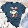 Groovy Teacher Halloween Retro Trick Or Teach Floral Ghost Women's Heather T-Shirt Heather Deep Teal Groovy Teacher Halloween Retro Trick Or Teach Floral Ghost Women's Heather T-Shirt Heather Deep Teal