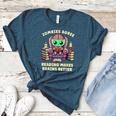 Halloween Teacher Zombie Reading Is Good For Brains Women's Heather T-Shirt Heather Deep Teal Halloween Teacher Zombie Reading Is Good For Brains Women's Heather T-Shirt Heather Deep Teal