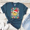 Santas Favorite Teacher Retro Groovy Smile Face Christmas Women's Heather T-Shirt Heather Deep Teal Santas Favorite Teacher Retro Groovy Smile Face Christmas Women's Heather T-Shirt Heather Deep Teal