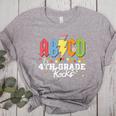 4th Grade Rocks ABCD Back To School Rock Teachers Women's Heather T-Shirt Athletic Heather