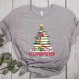All Booked For Christmas Xmas Tree Teacher Holiday Pajamas Women's Heather T-Shirt Athletic Heather