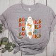 Booooks Ghost Halloween Groovy Vintage Teacher Book Reading Women's Heather T-Shirt Athletic Heather Booooks Ghost Halloween Groovy Vintage Teacher Book Reading Women's Heather T-Shirt Athletic Heather