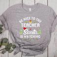 Christmas Be Nice To The Teacher Santa Is Watching Xmas Women's Heather T-Shirt Athletic Heather