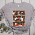 Cute Ghost Book Reading Books Lover Spooky Teacher Halloween Women's Heather T-Shirt Athletic Heather Cute Ghost Book Reading Books Lover Spooky Teacher Halloween Women's Heather T-Shirt Athletic Heather