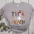 Fall Holiday Themed Thanksgiving Halloween Teacher Trick Or Women's Heather T-Shirt Athletic Heather