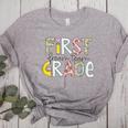 First Grade Dream Team Back To School 1st Grade Teacher Women's Heather T-Shirt Athletic Heather