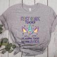 First Grade Teacher Definition Women's Heather T-Shirt Athletic Heather First Grade Teacher Definition Women's Heather T-Shirt Athletic Heather