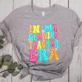 In My Glowing Teacher Era Groovy Colorful Bright Women's Heather T-Shirt Athletic Heather In My Glowing Teacher Era Groovy Colorful Bright Women's Heather T-Shirt Athletic Heather