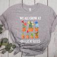 We All Grow At Different Rates Back To School Teacher Women's Heather T-Shirt Athletic Heather We All Grow At Different Rates Back To School Teacher Women's Heather T-Shirt Athletic Heather