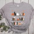Halloween Library Ghost Books Teacher Spooky Trick Or Teach Women's Heather T-Shirt Athletic Heather Halloween Library Ghost Books Teacher Spooky Trick Or Teach Women's Heather T-Shirt Athletic Heather