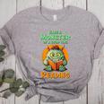 Halloween Teacher Librarian Monster Reading Books Men Women Kids Women's Heather T-Shirt Athletic Heather