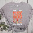 Having a Weird Music Teacher Builds Character Music Teacher Women's Heather T-Shirt Athletic Heather