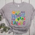 We Are Hungry For Learning Teacher Life Back To School Women's Heather T-Shirt Athletic Heather We Are Hungry For Learning Teacher Life Back To School Women's Heather T-Shirt Athletic Heather