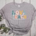 Love First Teach Second School Teacher Appreciation Women's Heather T-Shirt Athletic Heather Love First Teach Second School Teacher Appreciation Women's Heather T-Shirt Athletic Heather