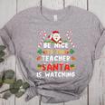 Be Nice To The Teacher Santa Is Watching Christmas Women's Heather T-Shirt Athletic Heather