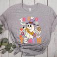 Retro Floral Ghost Trick Or Teach Groovy Teacher Halloween Women's Heather T-Shirt Athletic Heather