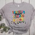 Retro Teaching Future Leaders Groovy Teacher Back To School Women's Heather T-Shirt Athletic Heather