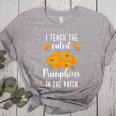 I Teach The Cutest Pumpkins In The Patch Halloween Teacher Women's Heather T-Shirt Athletic Heather I Teach The Cutest Pumpkins In The Patch Halloween Teacher Women's Heather T-Shirt Athletic Heather