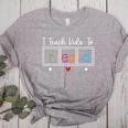 I Teach Kids To Read Reading Teacher Appreciation Women's Heather T-Shirt Athletic Heather
