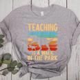Teaching Is a Walk In Park Dinosaur Teacher Women's Heather T-Shirt Athletic Heather