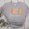 Toddler Teacher Retro Groovy Women Happy First Day Of School Women's Heather T-Shirt Athletic Heather