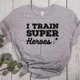 I Train Superheroes For Teacher Coach Men Women Women's Heather T-Shirt Athletic Heather I Train Superheroes For Teacher Coach Men Women Women's Heather T-Shirt Athletic Heather