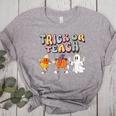 Trick Or Teach Candy Corn Pumpkin Ghost Teacher Women's Heather T-Shirt Athletic Heather