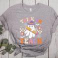 Trick Or Teach Groovy Teacher Halloween Retro Ghost Women's Heather T-Shirt Athletic Heather